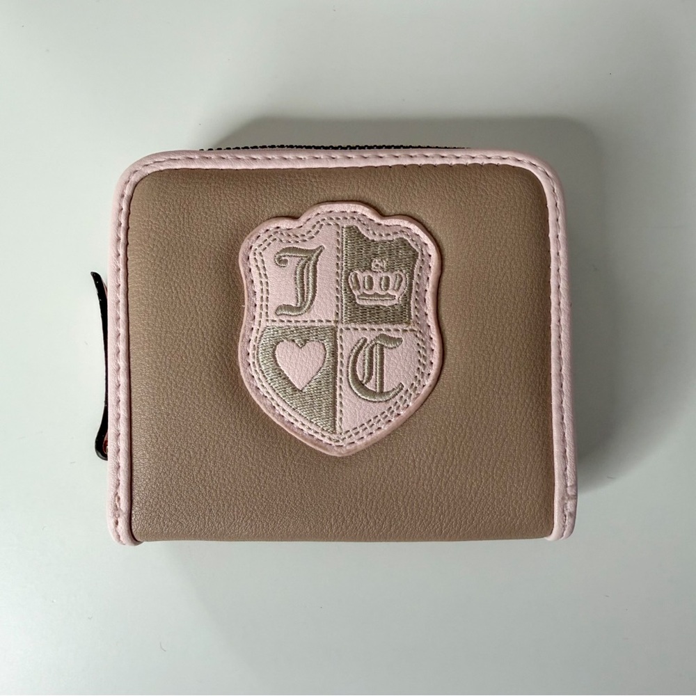 Juicy Couture Embroidered Shield Zip Wallet in Taupe and Blush Pink.